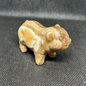 Chocolate calcite Pig